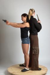 Adult Average White Fighting with gun Standing poses Casual Women